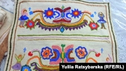 This precious, handcrafted embroidery over 100 years old was given to Olena Lazko by an elderly neighbor.