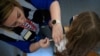 FRANCE-HEALTH-VACCINATION-HPV-PAPILLOMAVIRUS-EDUCATION/ A nurse injects a dose of human papillomavirus (HPV) vaccine at Theodore Monod college in Vern-sur-Seiche, suburb of Rennes, western France on October 9, 2023.
