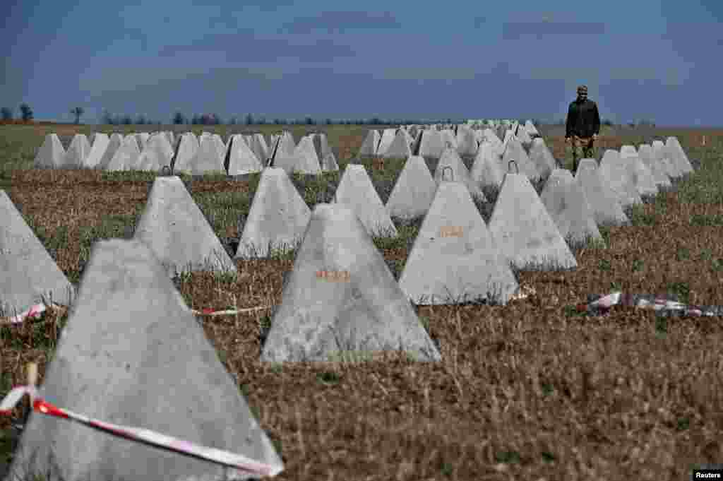 Pyramidal anti-tank obstacles known as &quot;dragon&#39;s teeth&quot; are inspected before being installed.&nbsp; The Wall Street Journal reported on March 7 that Ukrainian troops are building the fortifications in expectation of a Russian offensive in the spring, though there are worries that the&nbsp;progress&nbsp;is not fast enough. &nbsp;