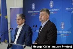 Fostul premier Marcel Ciolacu (prim-plan), alături de fostul ministru de Finanțe Marcel Boloș.