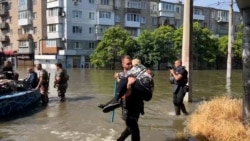 Fleeing Floods, Ukrainians Make Perilous Boat Journeys To Safety