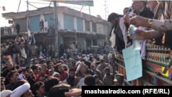 د صوابۍ احتجاجیانو پر پولیسو غږ وکړ چې ژرترژره دې وسلوال ونیسي - د ډېسېمبر ۱۲مې انځور.