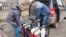 Volunteers load up generators that were purchased thanks to Peykov's fund-raising campaign in Bulgaria.