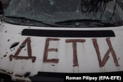 Обстріляне авто в Бучі