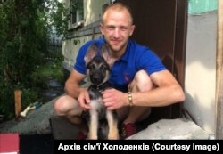 Павло Холоденко разом із своєю улюбленою собакою Нікою