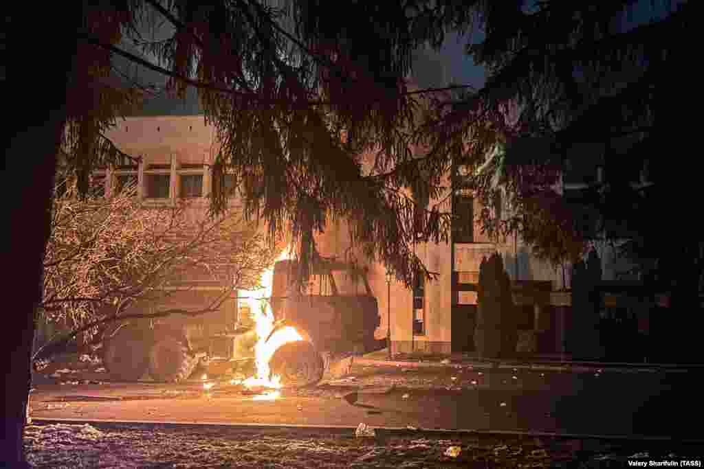 A truck burns next to the mayor&#39;s office in Almaty on the evening of January 5. There was violence and looting overnight in the city after massive anti-government protests swept much of the country.&nbsp;