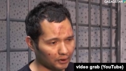 Викрам Рузахунов после задержания в Алматы. Скриншот из сюжета казахстанского телеканала.