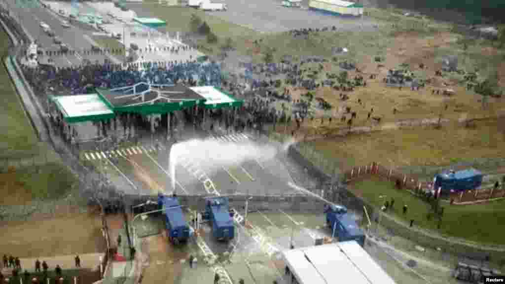 In November 2021, serious clashes broke out (pictured) between migrants and Polish border guards at the Poland-Belarus border near Grodno, Belarus. Some 2,000 migrants were at the frontier in makeshift camps in the freezing weather, but only about 100 were believed to be involved in attacking the Polish forces at the crossing, said Border Guard spokeswoman Anna Michalska.&nbsp; &nbsp;