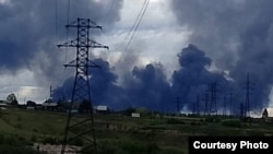 Smoke billows into the sky after a Ukrainian drone attack in Russia's Irkutsk region.