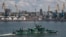 Корабль ВМС России на страже в грузовом морском порту Мариуполя, 12 июня 2022 года