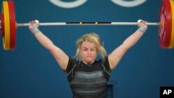 Беларуска Сюзана Валодзька на Алімпіядзе 2024 году ў Парыжы, дзе яна выступала ў нэўтральным статусе. Яна паказала там чацьвёрты вынік у вагавай катэгорыі да 71 кг