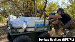 Завантажений НРК 93-ої ОМБр для поповнення припасів однієї з позицій поблизу фронту перед стартом