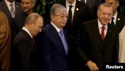 Азиядағы өзара ықпалдастық және сенім шаралары жөніндегі саммитке қатысқан Ресей, Қазақстан және Түркия басшылары. Душанбе, 15 маусым 2019 жыл.