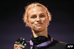 Марыя Жодзік з срэбраным мэдалём, 21 верасьня 2025 году, Токіё, Японія