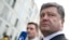 Ukrainian presidential frontrunner Petro Poroshenko gives a statement to the media earlier this month. A new report has given qualified approval to the press's coverage of the presidential election campaign. 