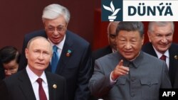 Russiýanyň prezidenti Wladimir Putin we Hytaýyň lideri Si Szinpin. 3-nji sentýabr, 2025 ý. Pekin, Hytaý.