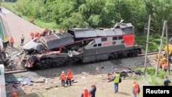 Aftermath of bridge collapse and train derailment in Russia's Bryansk region