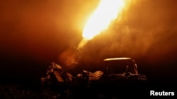 Военнослужащий 115-й отдельной механизированной бригады Вооруженных сил Украины стреляет из зенитного пулемета, 17 июля 2025 года