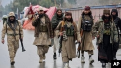 Taliban fighters patrol in a remote region of eastern Afghanistan. (file photo)
