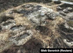 Окопи, вириті російськими військовими на території урочища "Рудий ліс" під час окупації цієї території