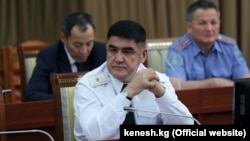 Курсан Асанов.