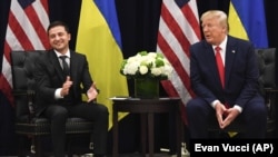 Ukrainian President Volodymyr Zelenskiy (left) and U.S. President Donald Trump meet for talks in New York on September 25.