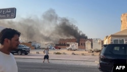 Smoke billows after an Israeli air strike in the Qatari capital, Doha, on September 9.