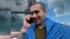 'Hello Mom, I'm Home!': Hugs And Cheers As Ukraine And Russia Swap POWs video grab 1