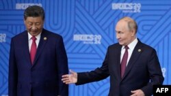 Лідери Китаю і Росії Сі Цзіньпін і Володимир Путін під час саміту БРІКС у Казані, РФ, 23 жовтня 2024 року