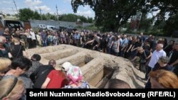 Похороны семьи, погибшей в результате российского удара по Киеву 31 июля
