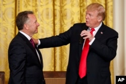 US President Donald Trump (right) and Witkoff in 2018