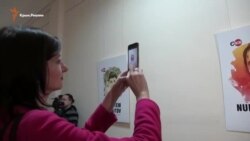 Kiyevde Rusiye siyasiy mahbüsleri fotosüretleriniñ sergisi açıldı (video)