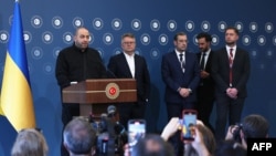 Ukrainian Defense Minister Rustem Umerov (left), who headed the delegation, is joined by Deputy Foreign Minister Serhiy Kyslytsya (second left) and delegation member Oleksandr Bevz (right) at a press conference in Istanbul on June 2. 