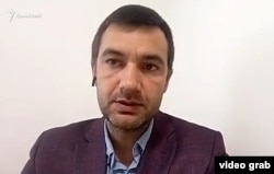 Денис Яшний, керівник моніторингової групи Кримського інституту стратегічних досліджень. Скриншот відео