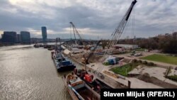 Construction is under way at the site of a new bridge on the Sava River in Belgrade. 