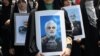 Антиизраильская манифестация в Тегеране после израильских ударов. Люди несут портреты убитых во время атаки генералов и ученых-ядерщиков. 13 июня 2025 года