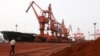 Soil containing various rare-earth elements waits to be loaded on to a ship at a port in Lianyungang, China. (File photo)