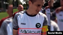 Лого VM Groupe на формі футбольного клубу «Рокита»