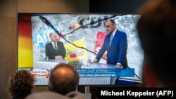 Олаф Шольц і Фрідріх Мерц, передвиборчі дебати, 19 лютого 2025 року. (Фото AFP)