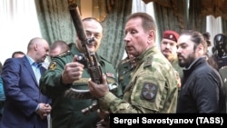 Russian National Guard head Zolotov (center right) challenged Navalny to a duel. But can he compete in breast-feeding, bookkeeping, or jesting?