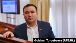 Алишер Козуев