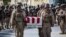 US soldiers act as pallbearers for the 13 service members killed in a bombing at Kabul airport in August 2021. 