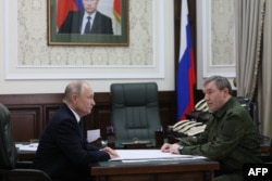 ვლადიმირ პუტინი და ვალერი გერასიმოვი