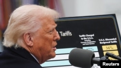 Президент США Дональд Трамп оголошує про запровадження нових мит на імпорт товарів до США. Білий дім, Вашингтон. США, 2 квітня 2025 року