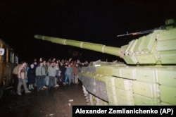 Lithuanians attempt to block a Soviet tank near the main broadcasting facility in Vilnius on January 13, 1991.