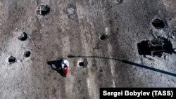 Антонівський міст через Дніпро, який з’єднує окупований Херсон із лівобережжям, після перших ударів по ньому ЗСУ. Херсон, 20 липня 2022 року