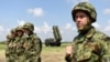 Serbian Army soldiers stand near the Chinese medium-range missile system FK-3, the latest weapon received by the Serbian Army, during a demonstration of Serbian Army's air defence capabilities, "Shield 2022", at the military airport "Colonel-pilot Milenko Pavlovic" in Batajnica, near Belgrade, Serbia, April 30, 2022