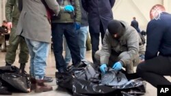 Фото Следственного комитета РФ. 23 марта 2024