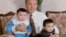 KAZAKHSTAN -- Kazakh President Nursultan Nazarbayev with his grandchildren - Aysultan (Left) and Altay. 1992