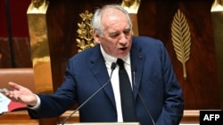 French Prime Minister Francois Bayrou delivers his general policy statement during the parliamentary extraordinary session prior to a confidence vote over the government's austerity budget, at the National Assembly in Paris on September 8, 2025.